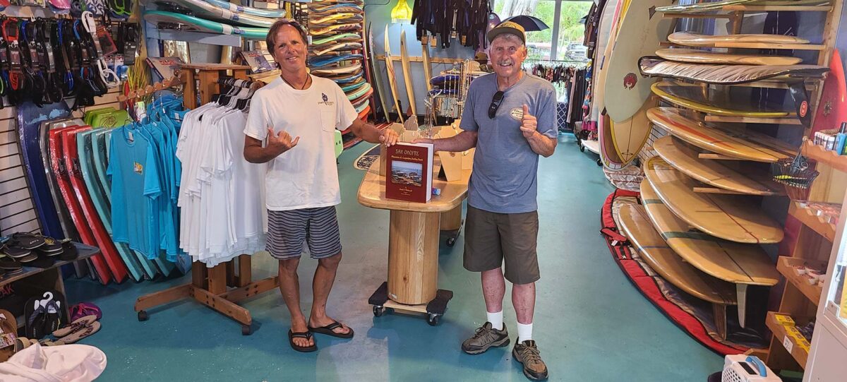 Dave Elias (left), proprietor of Island Trader Surf Shop